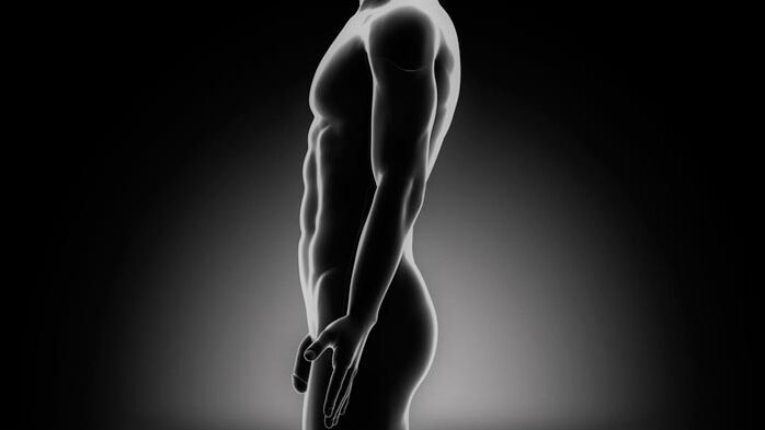 A man is doing exercises to enlarge the penis