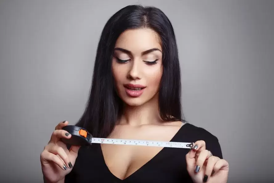 Girl after increasing pomp by measuring centimeters and penis